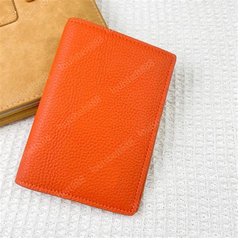 designer passport wallet for women.